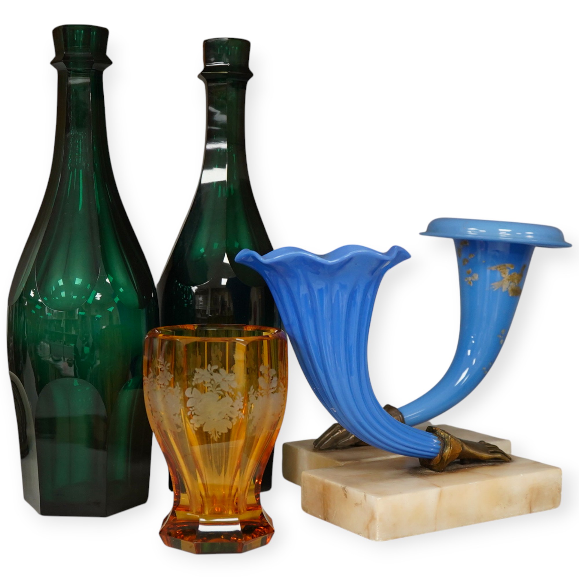 A pair of 19th century green glass bottles, two glass cornucopia and an amber glass, tallest 29cm